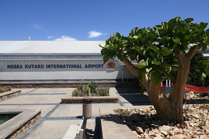 Airport Shuttle - Pickup at the Airport: Name Boards, Luggage Help, and Timing