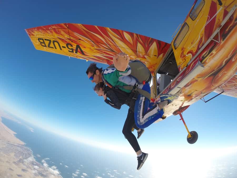 From Swakopmund: Tandem Sky Diving - The scenic flight up: 15 minutes to see ocean and desert align
