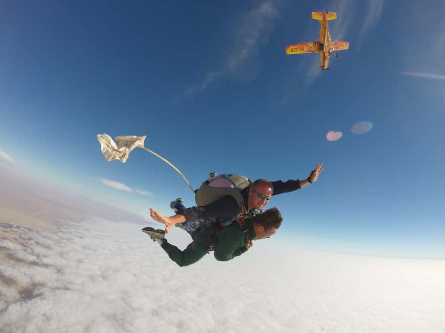 From Swakopmund: Tandem Sky Diving - The pre-jump scene: briefing, harnessing, and waiting your turn