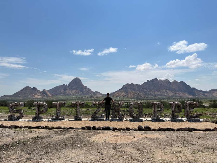 Swakopmund: Spitzkoppe Day Tour with Hotel Pickup - Ascending Spitzkoppe: hiking time plus rock drawings and tribal history