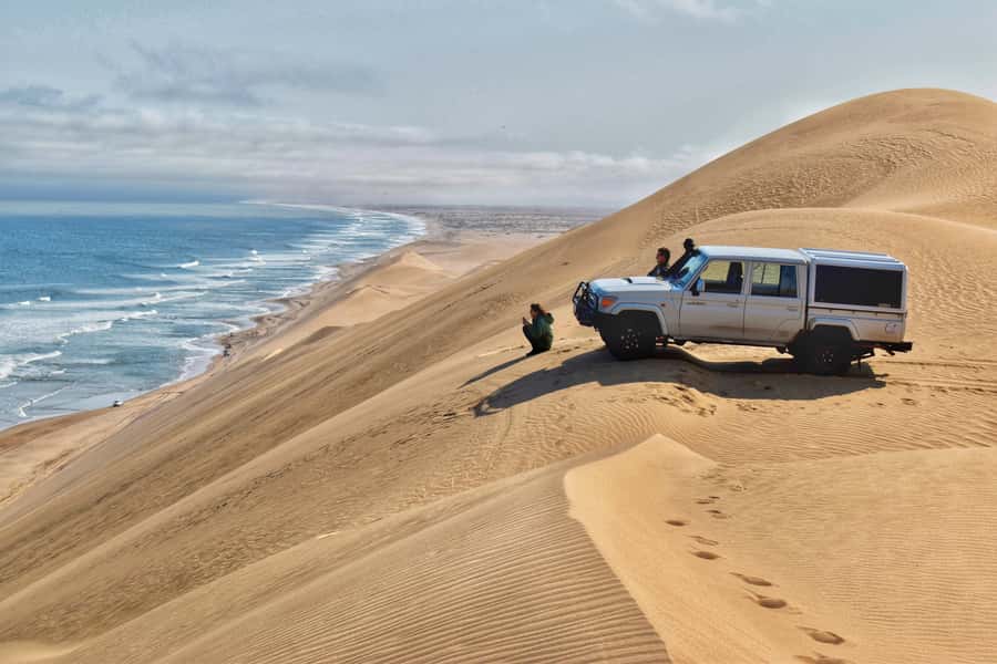 Walvis Bay: Sandwich Harbour Half-Day 4x4 Scenic Excursion - Getting there from Flamingo Villas, and what the start feels like