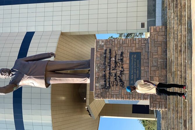 Windhoek: City Tour - The National Museum and Alte Feste pass-by, colonial layers explained in motion